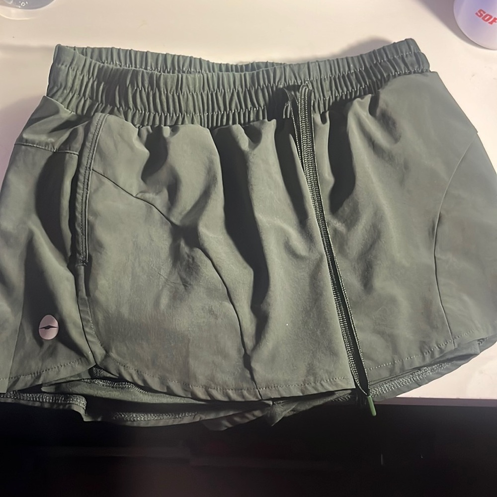 Green athletic shorts